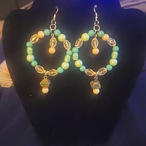 Beautiful  teal color stone beads hoops.